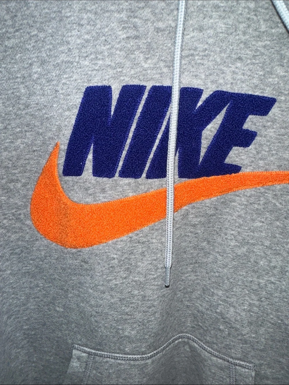 Nike Gray Hoodie with Blue Logo and Orange Swoosh Accent